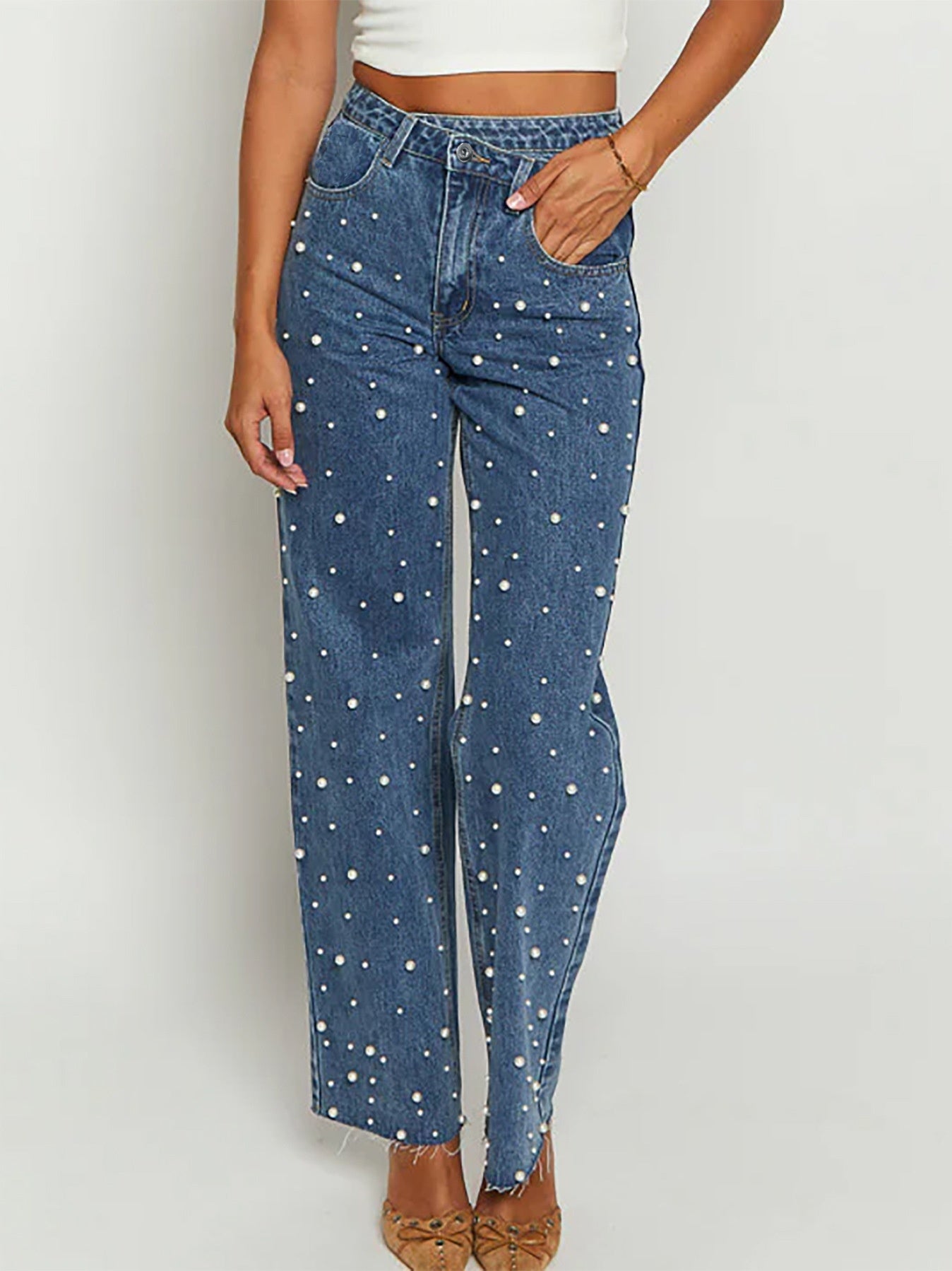 Slanted waist crossover jeans with straight leg and frayed hem